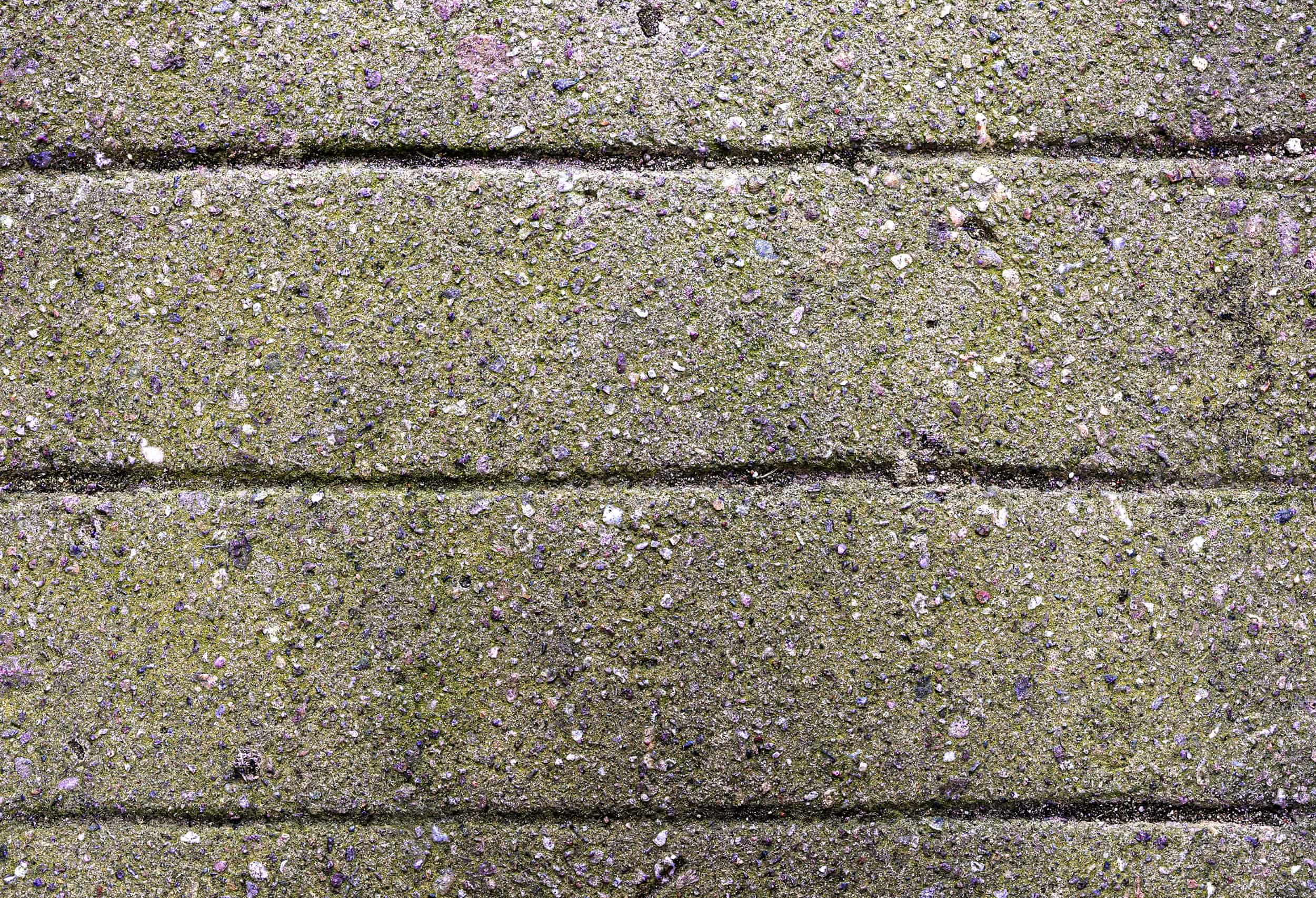 why does concrete change color